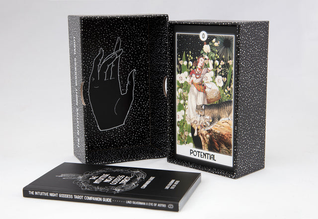 The Intuitive Night Goddess Tarot open deck box, showing the tarot card Potential, with the guidebook laying flat in front of it