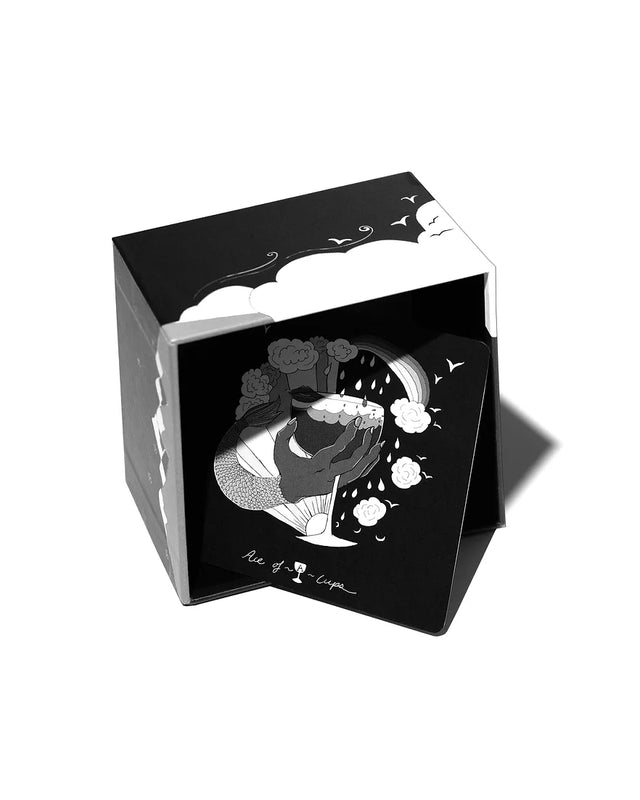 Dark Days Tarot open deck box with one tarot card coming out