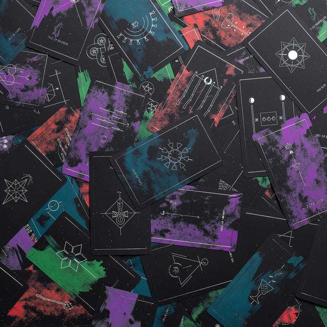 A pile of tarot cards from Synesthesia Tarot Deck